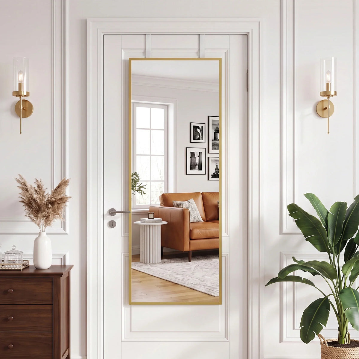 Full length mirror with gold-tone frame mounted on white panel door