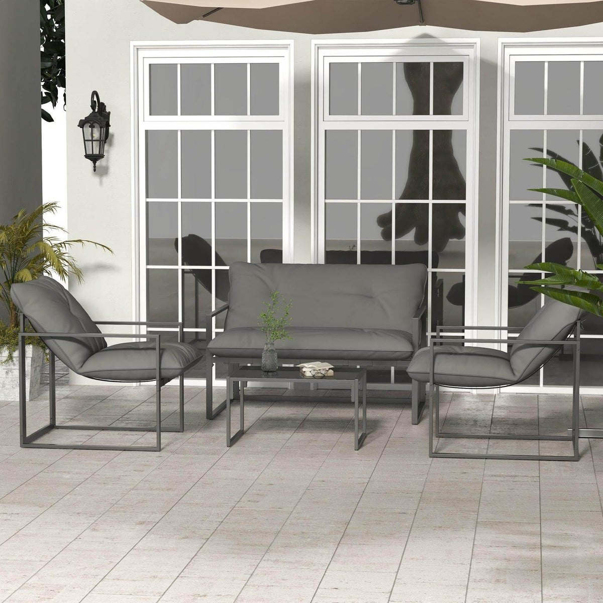 Grey outdoor sofa set with loveseat, two single armchairs, and rectangular coffee table