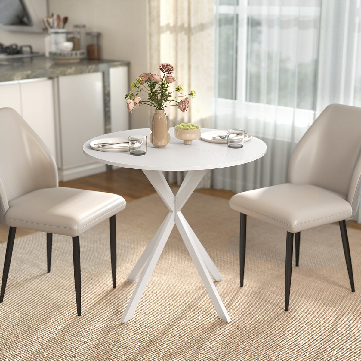 White round dining table with X-shaped legs, seating area for four in kitchen setting