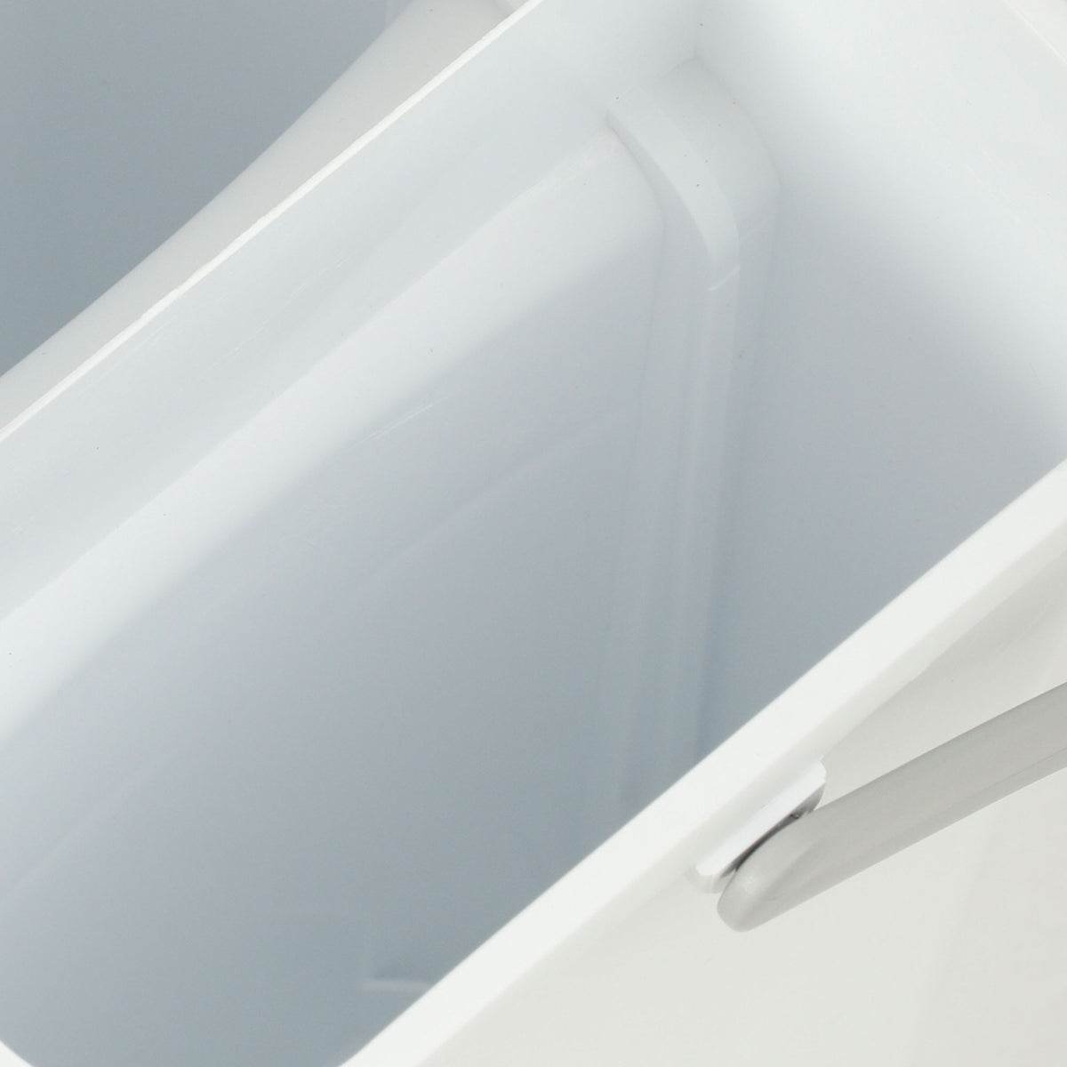 White wringer bucket with smooth curved basin interior