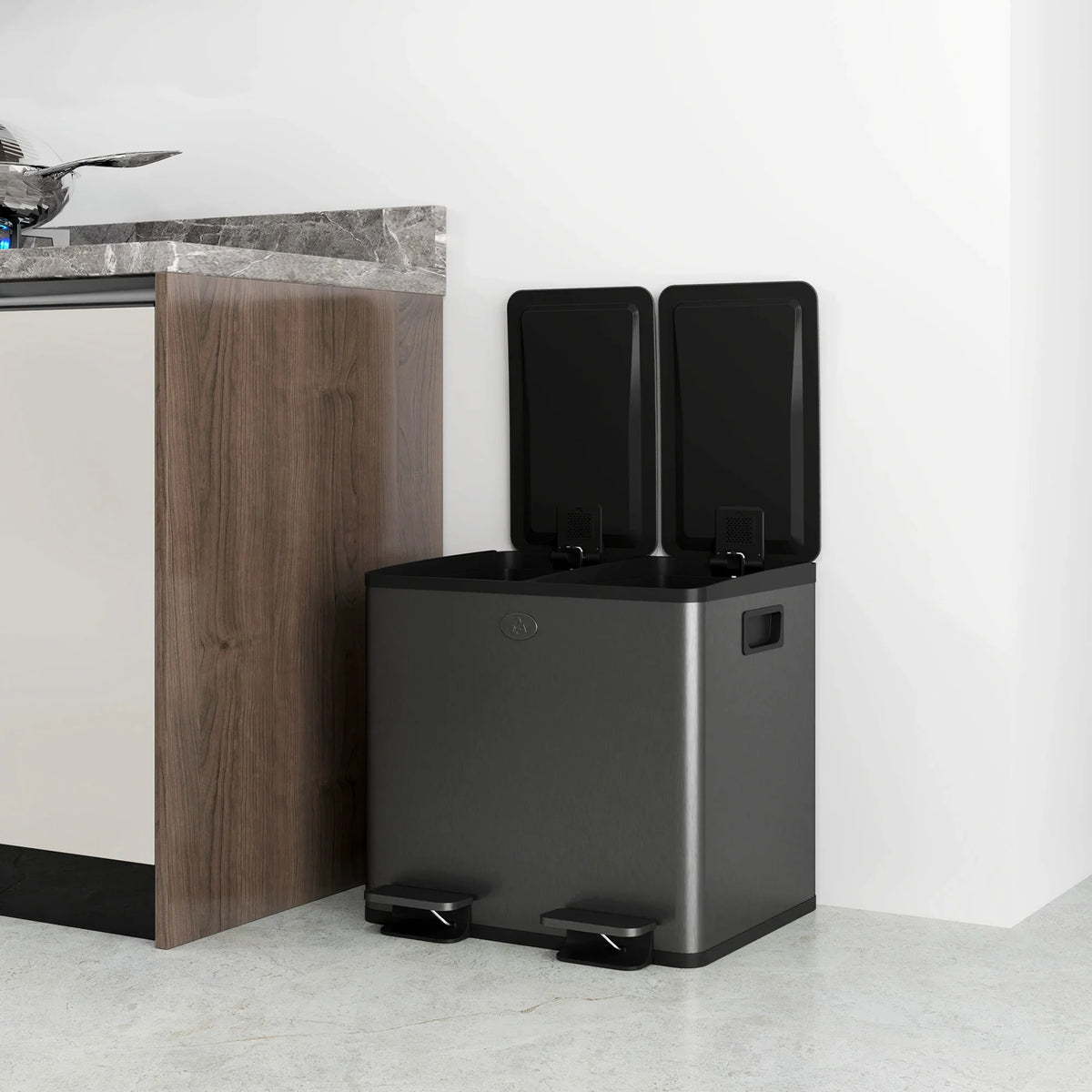 Black stainless steel dual compartment recycling bin with two open lids and pedals