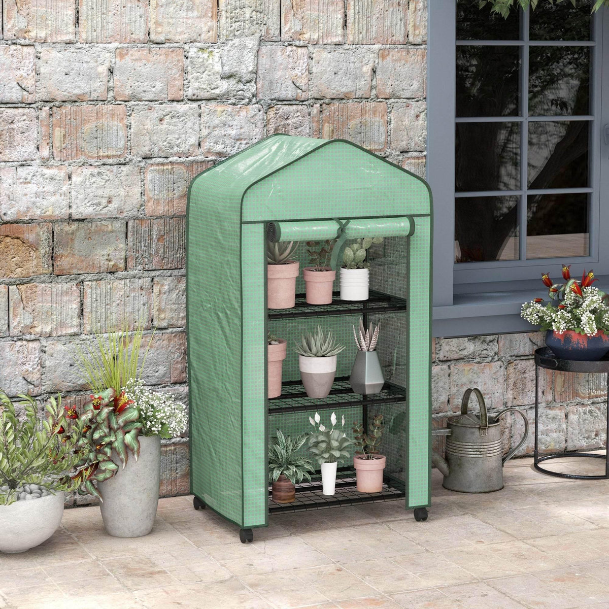 Green compact 3-tier greenhouse with zip-style front panels and open shelving