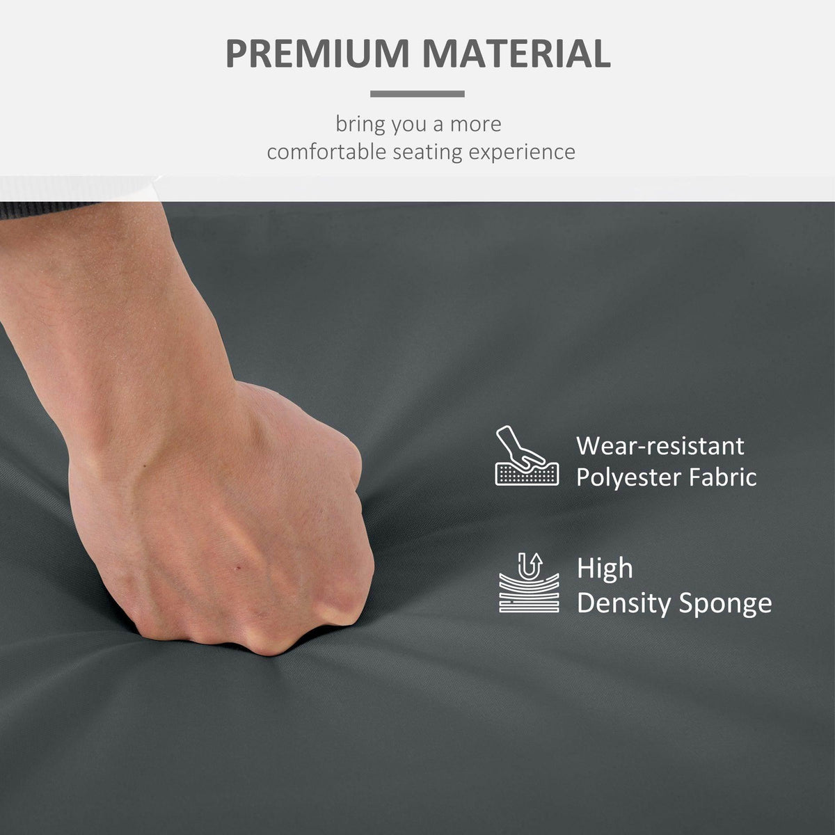 Dark grey cushion fabric close-up with hand pressing surface