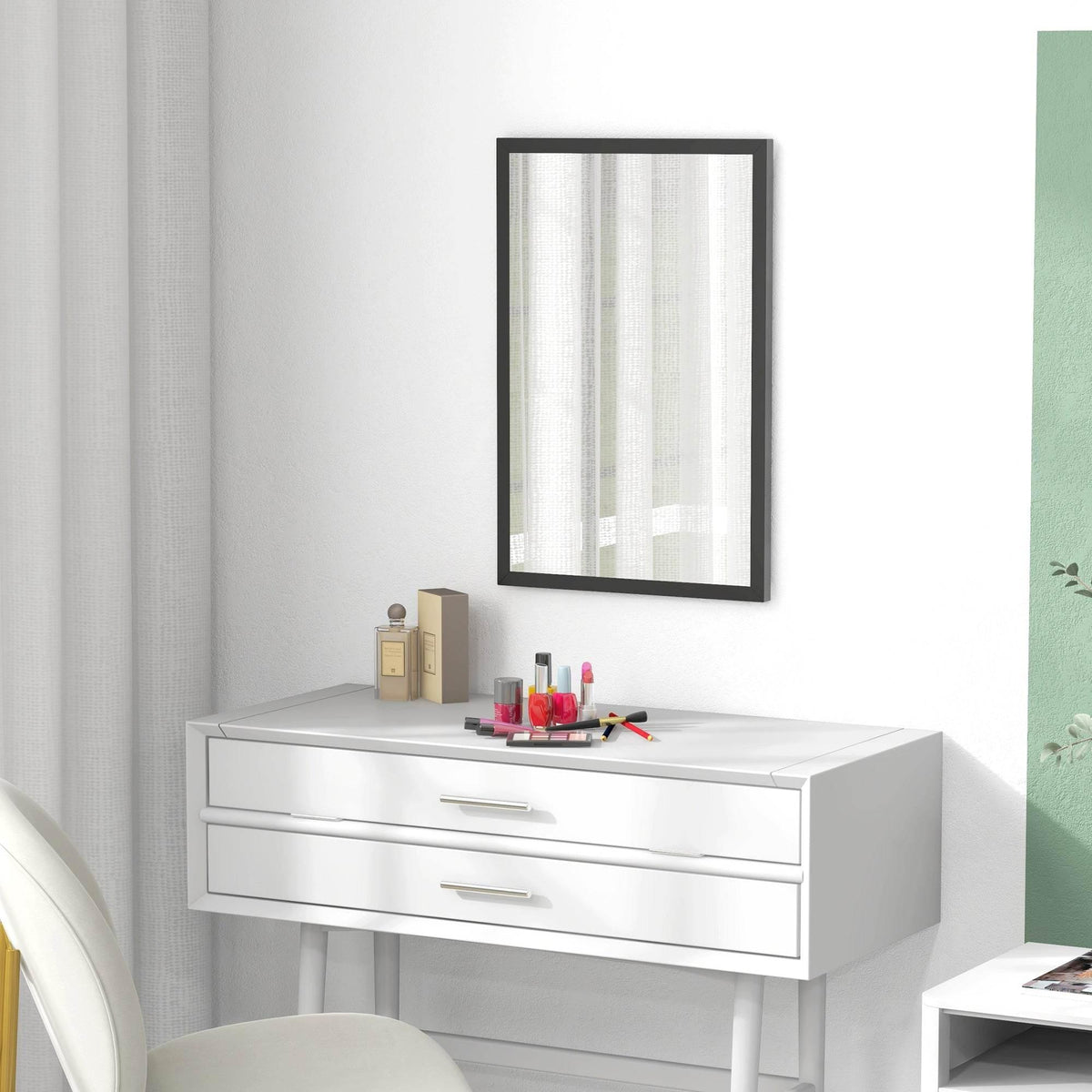 Rectangular black wall mirror with slim frame above a white vanity and drawers