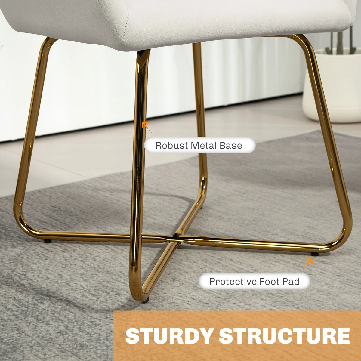 Cream accent arm chair lower frame with gold metal base and protective foot pads