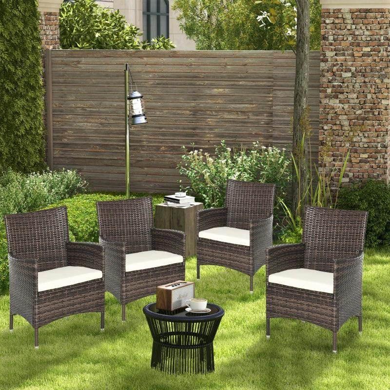 Outdoor rattan armchairs set of four with cream seat cushions and metal legs