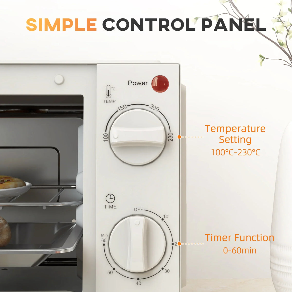 Cream control panel on mini oven with temperature and timer dials