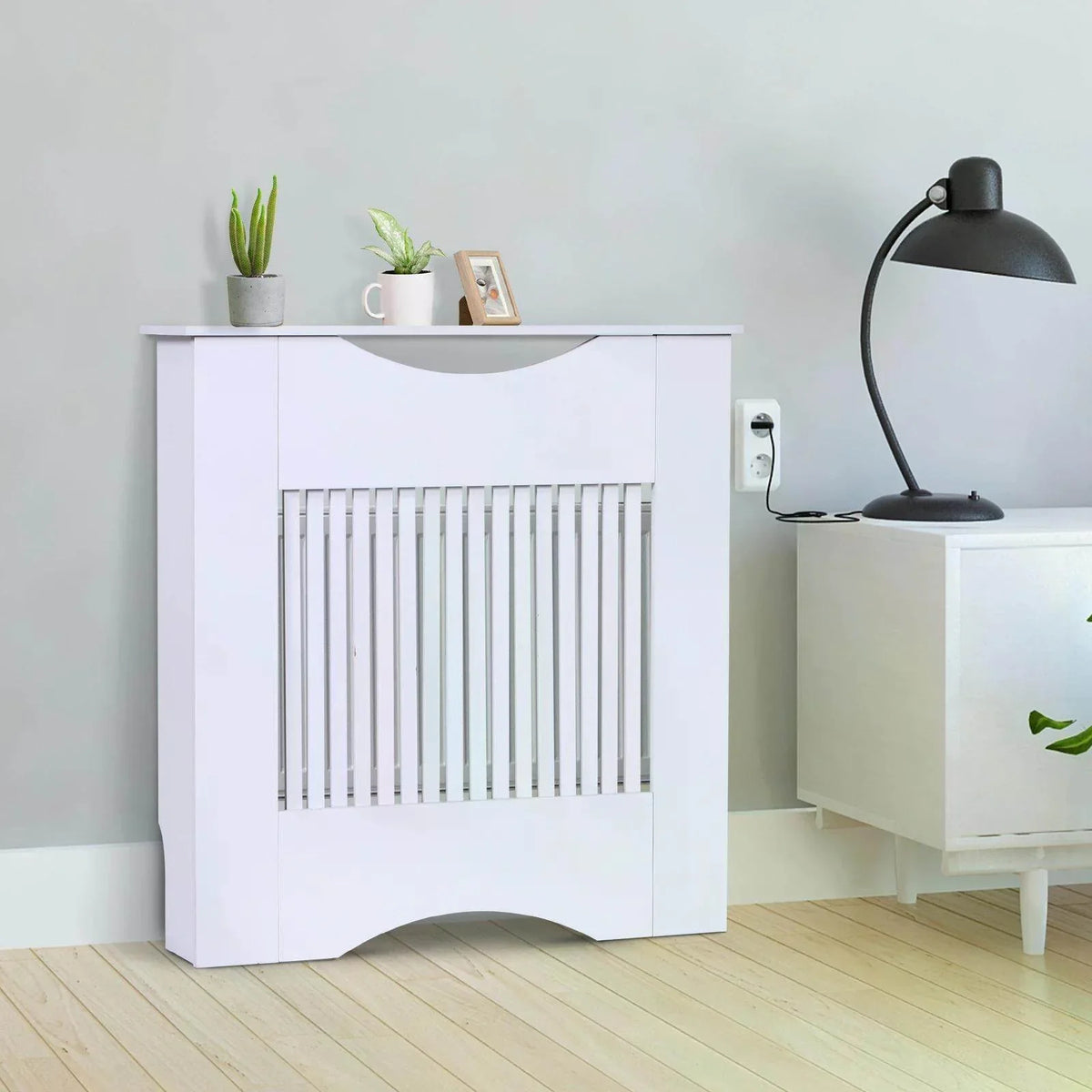 White MDF radiator cover with vertical slatted vent panel and arched lower opening