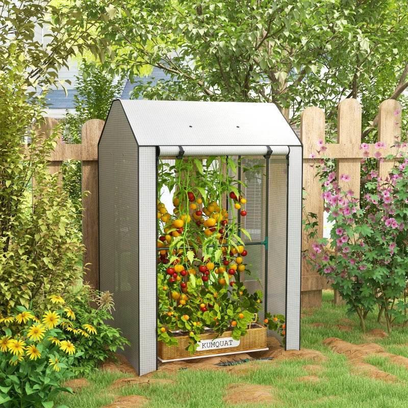 Portable mini greenhouse with rolled-up door, white frame, mesh cover, and plant shelf inside