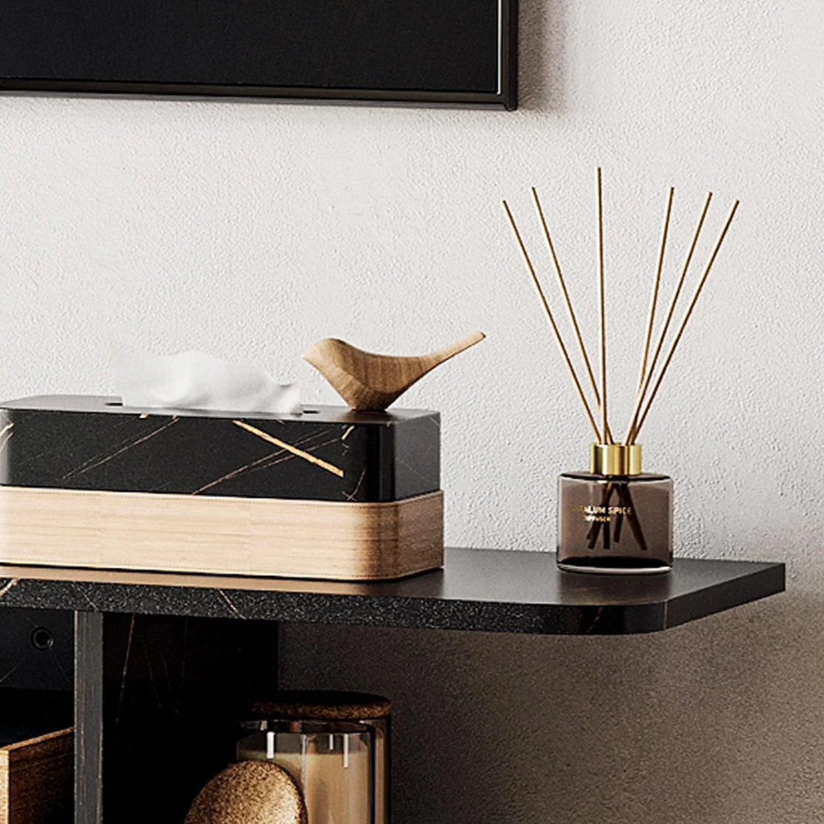 Black floating TV console with open shelves and top surface for decor.