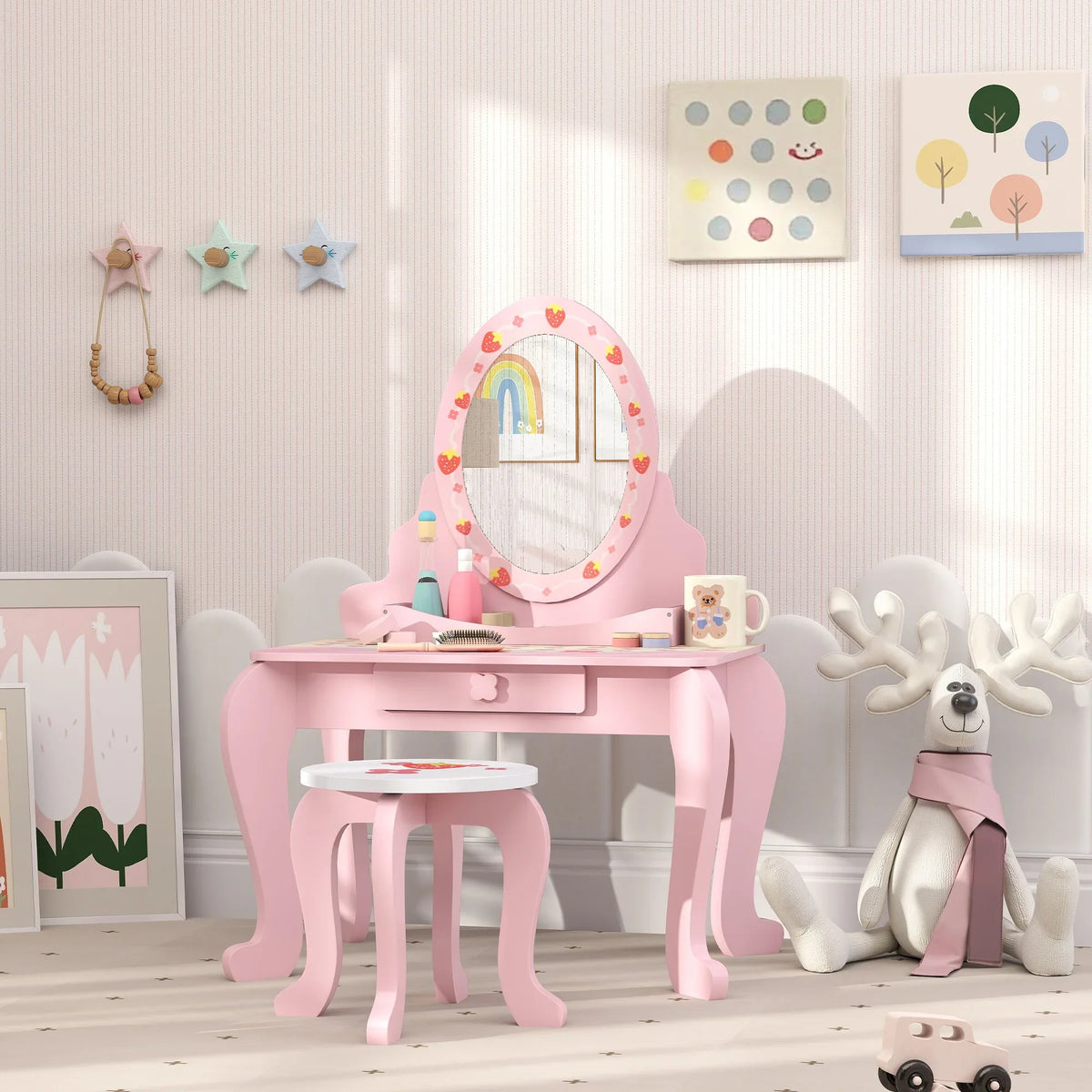 Pink kids dressing table set with oval mirror and drawer, styled with accessories