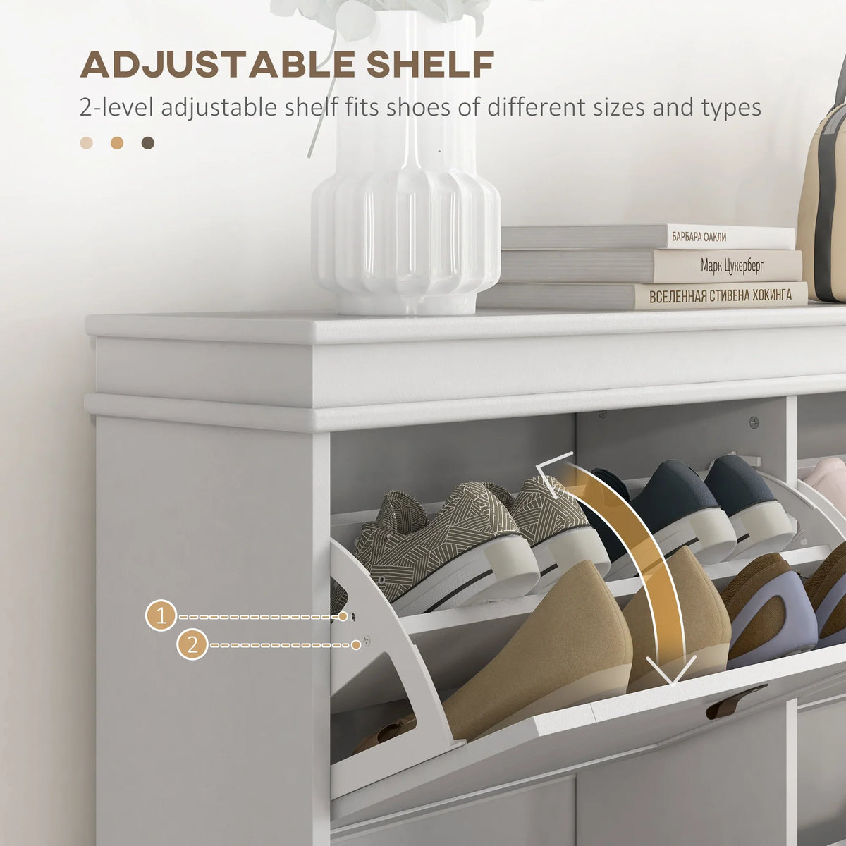 White shoe cabinet with a 2-level adjustable shelf inside an open flip drawer.