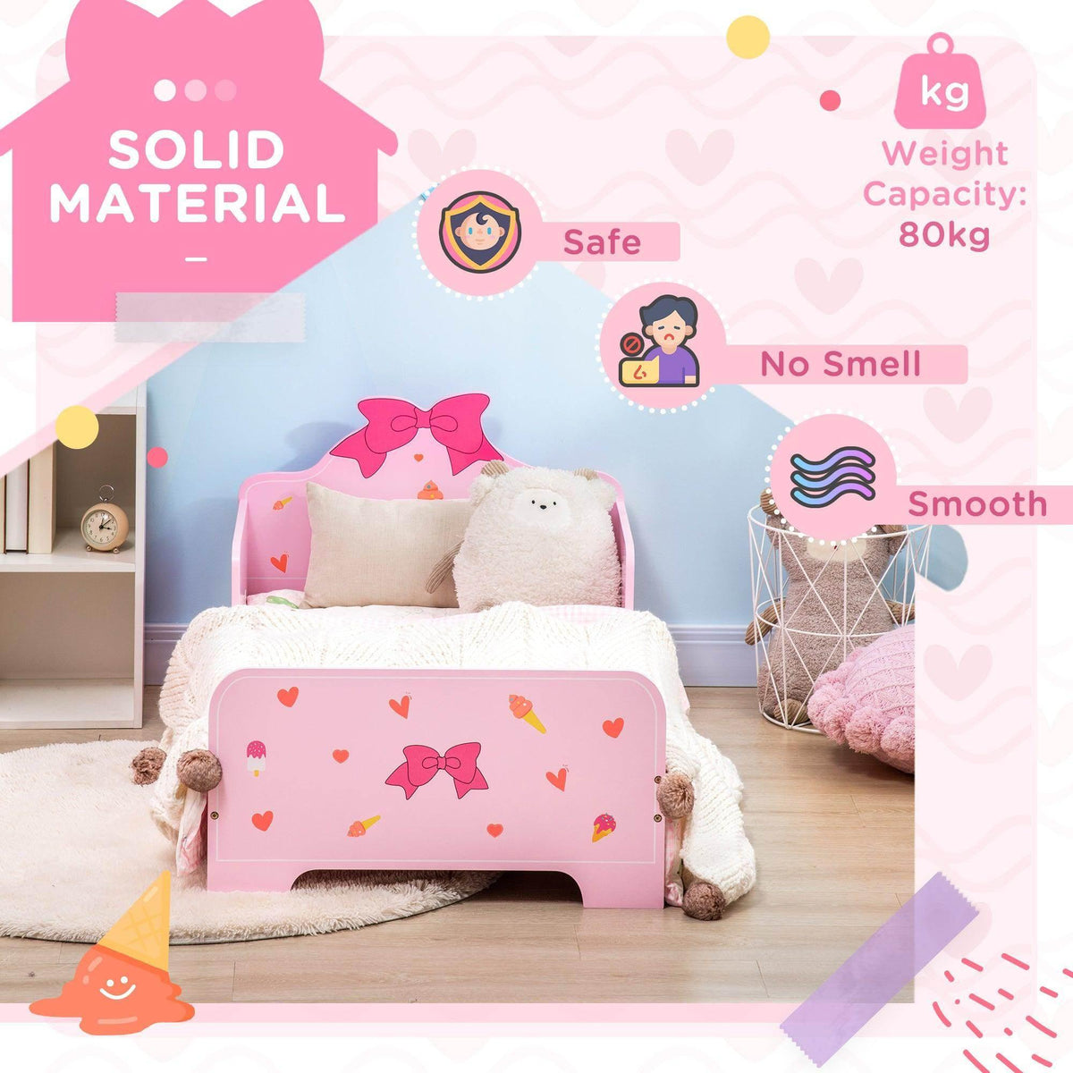 Pink toddler bed with heart and bow pattern, plush mattress and cute decor