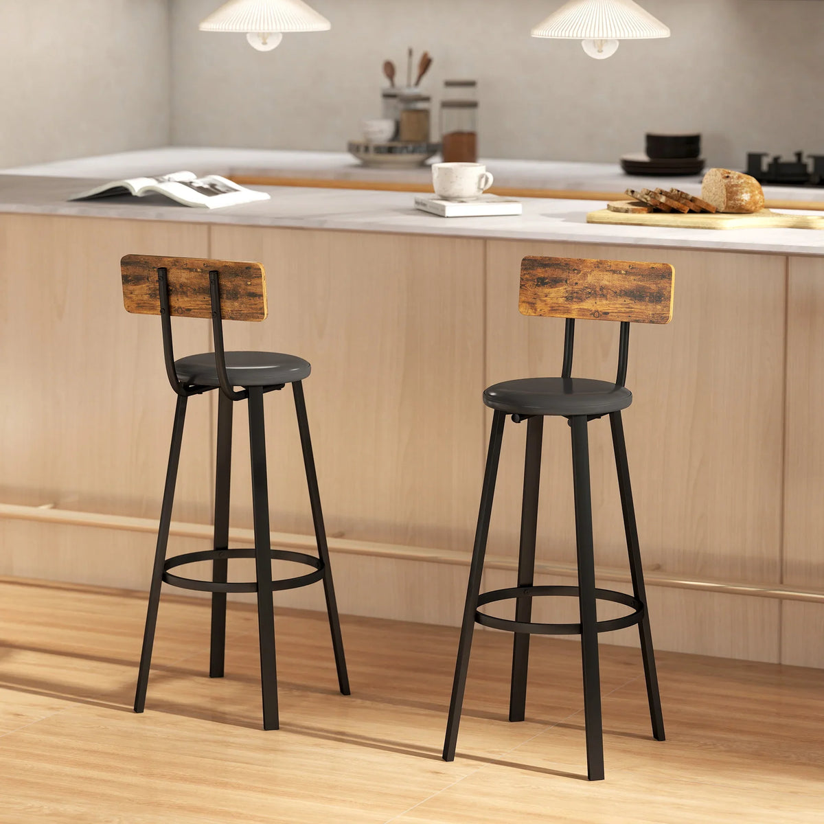 Set of two black metal bar stools with dark wood back panels and circular footrests