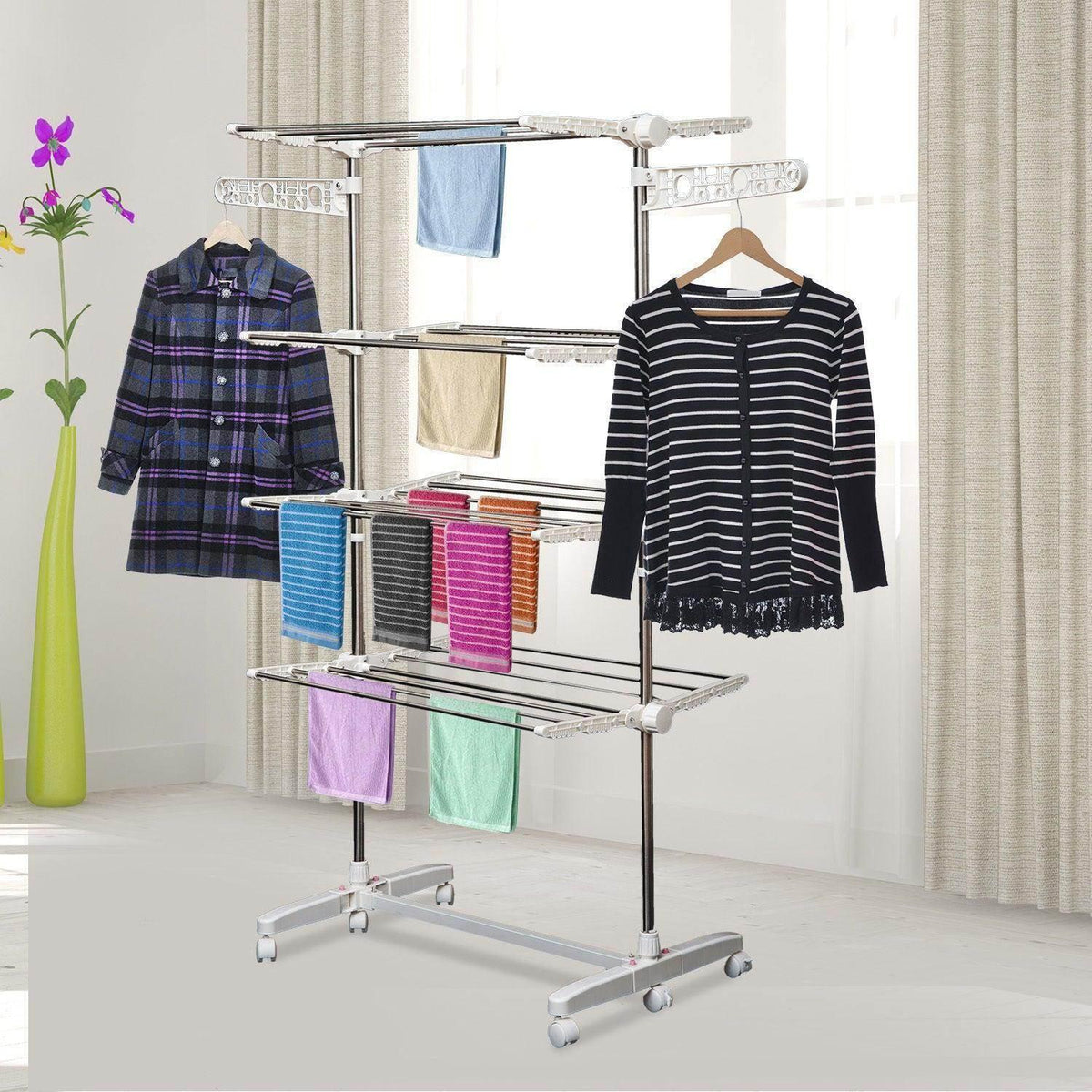 4-layer folding clothes rail with chrome frame and four hanging bars, on wheels
