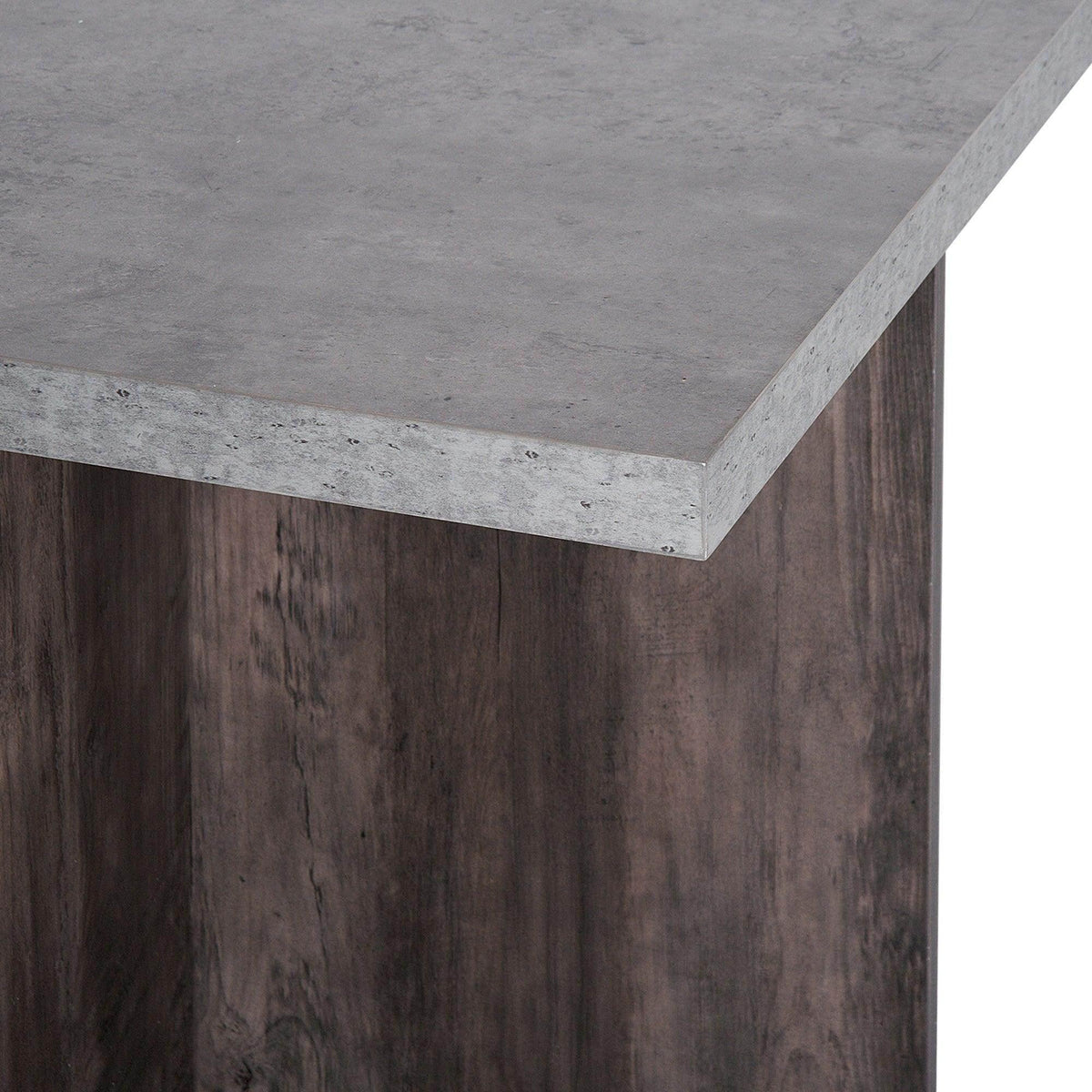 Close-up of dark wood dining table corner with flat top and visible wood grain