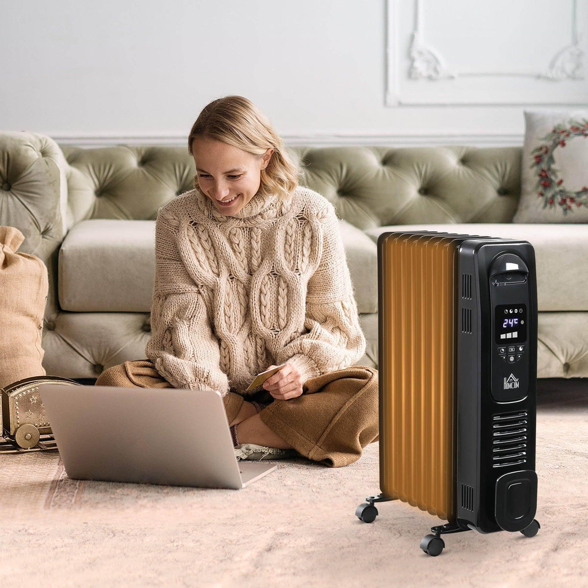 Black 9-fin oil filled heater with digital control panel and rolling caster wheels