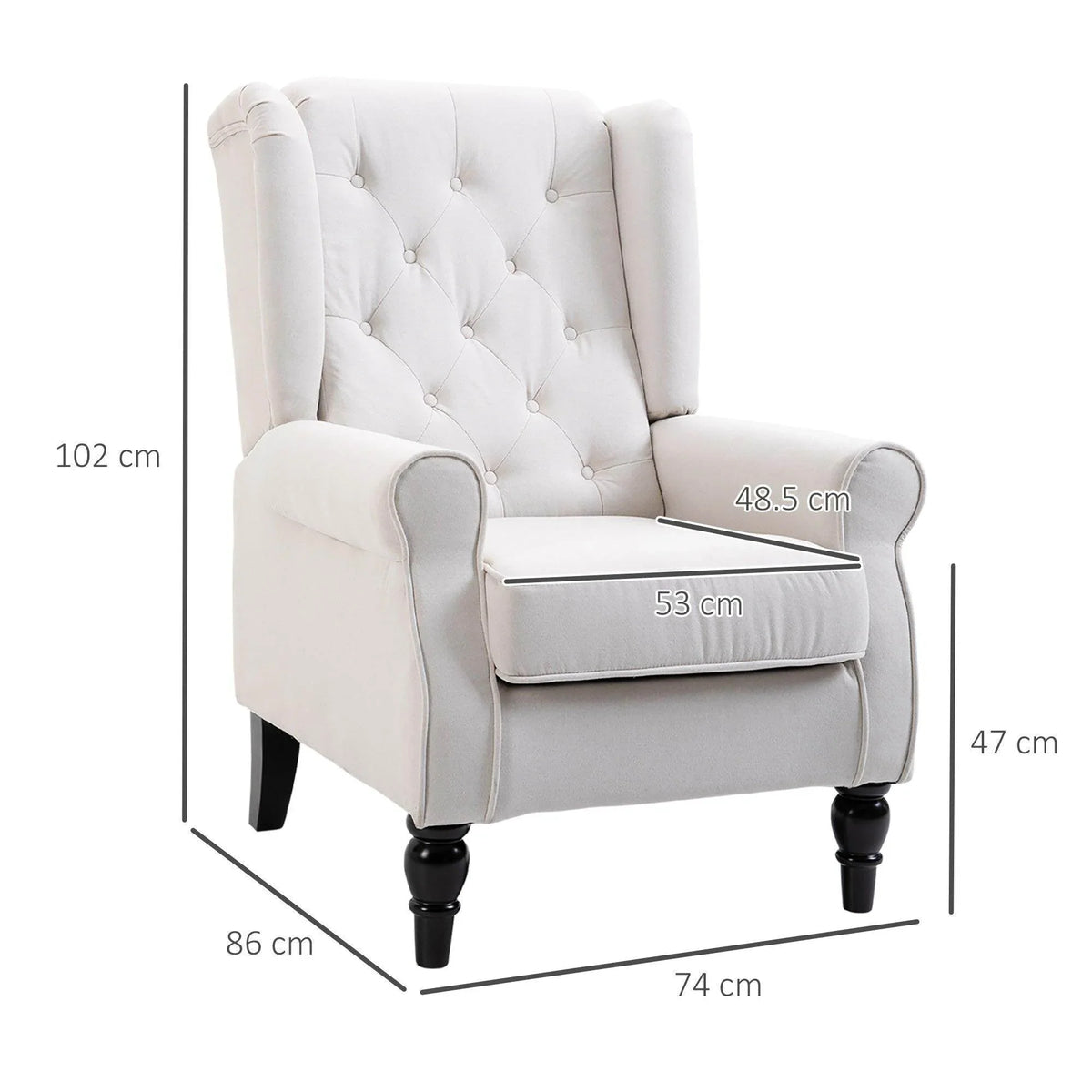 Cream tufted club armchair with rounded arms and padded seat, black turned legs.