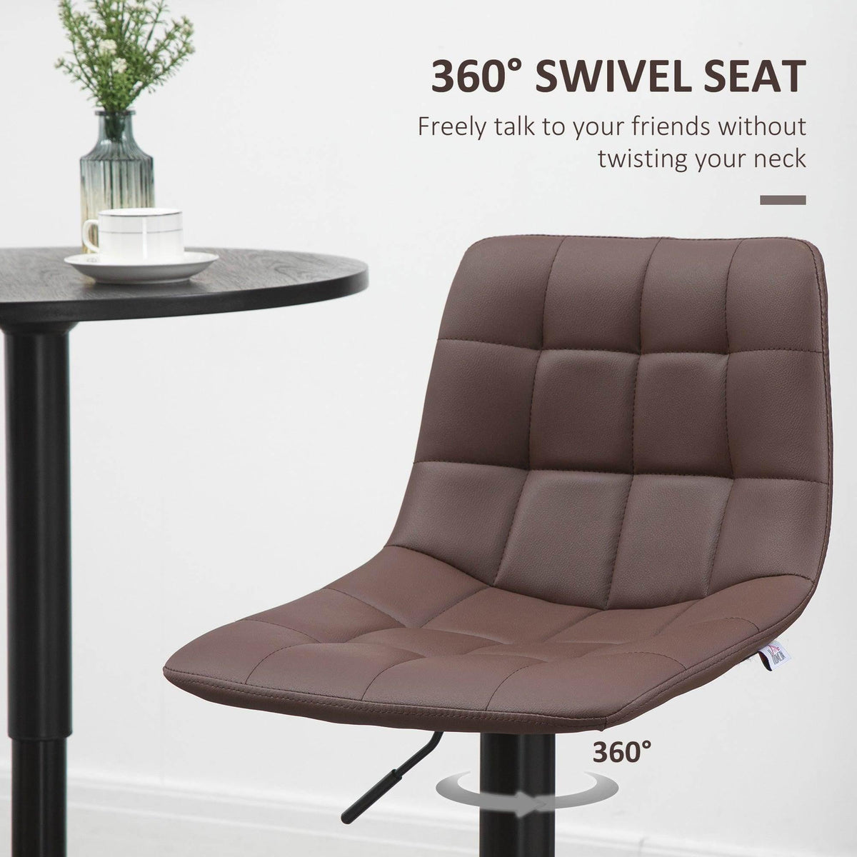 Swivel bar stool with brown padded seat and back, black pedestal base and footrest