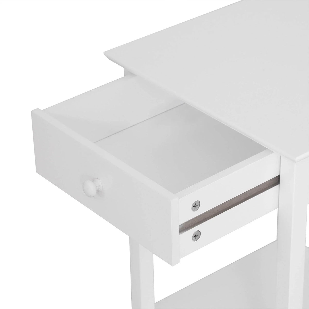 White bedside table drawer with round knob and open compartment, close-up
