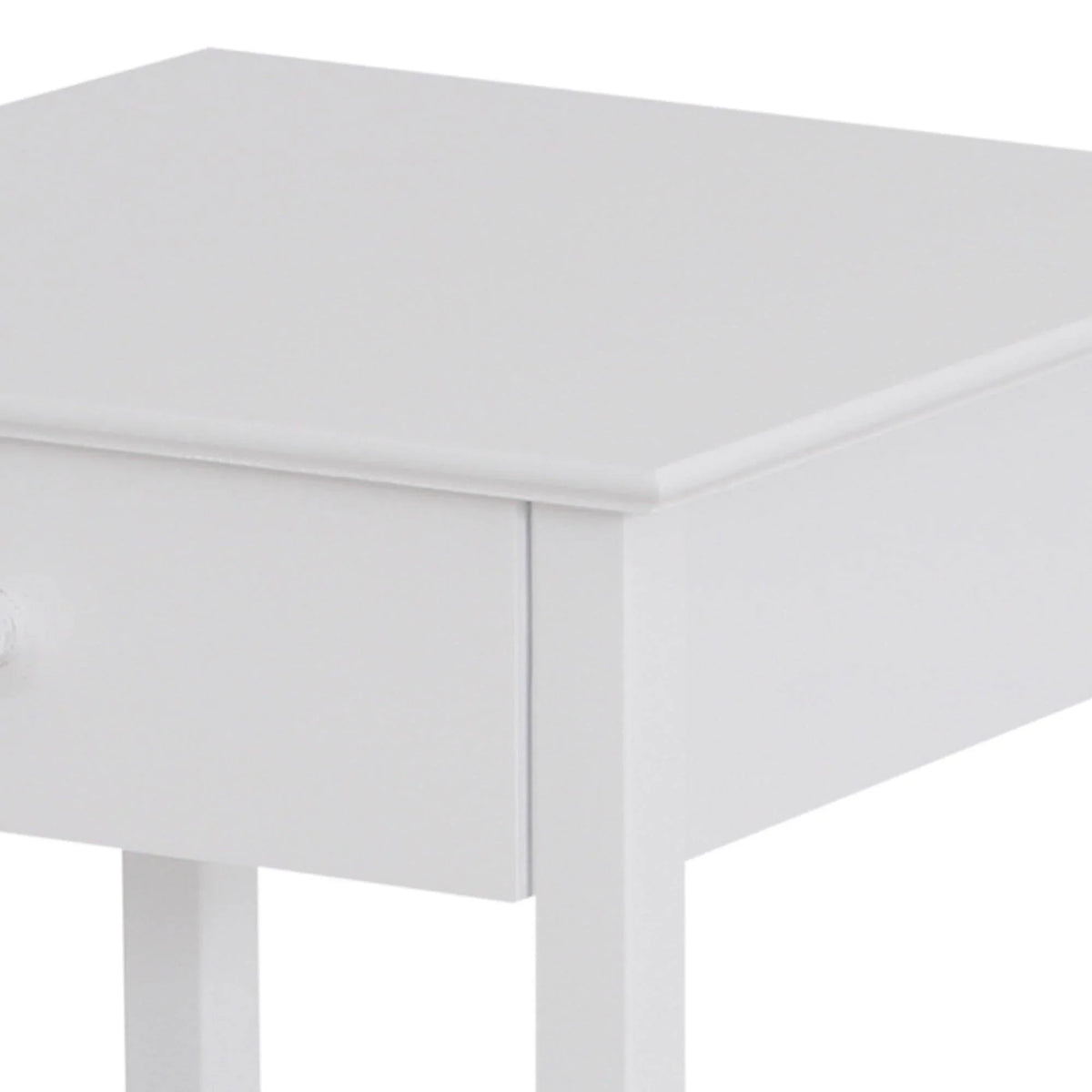 White bedside table corner with smooth top panel and straight sides, close-up