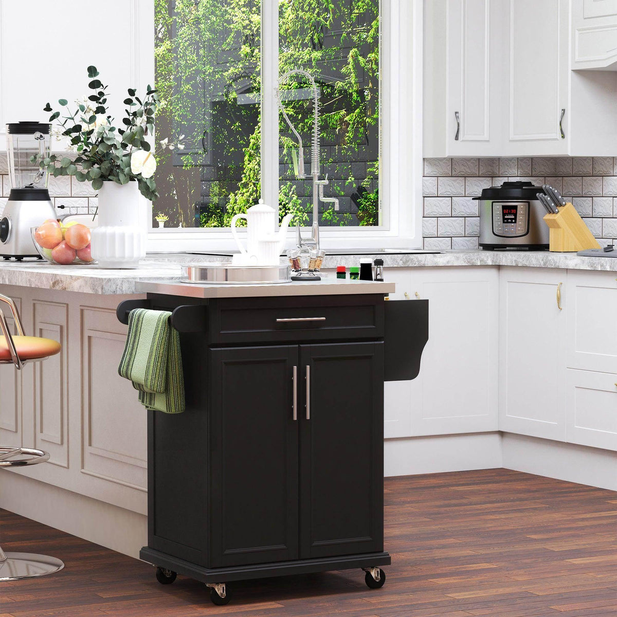Black kitchen island cart with stainless steel top, drawer, and cabinet doors on casters.