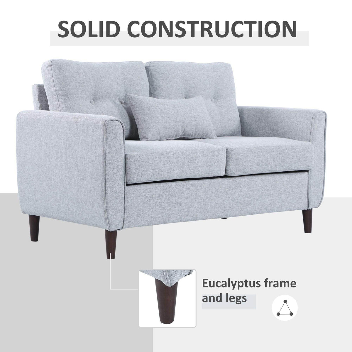 Light grey upholstered loveseat with tufted back cushions and dark wooden legs