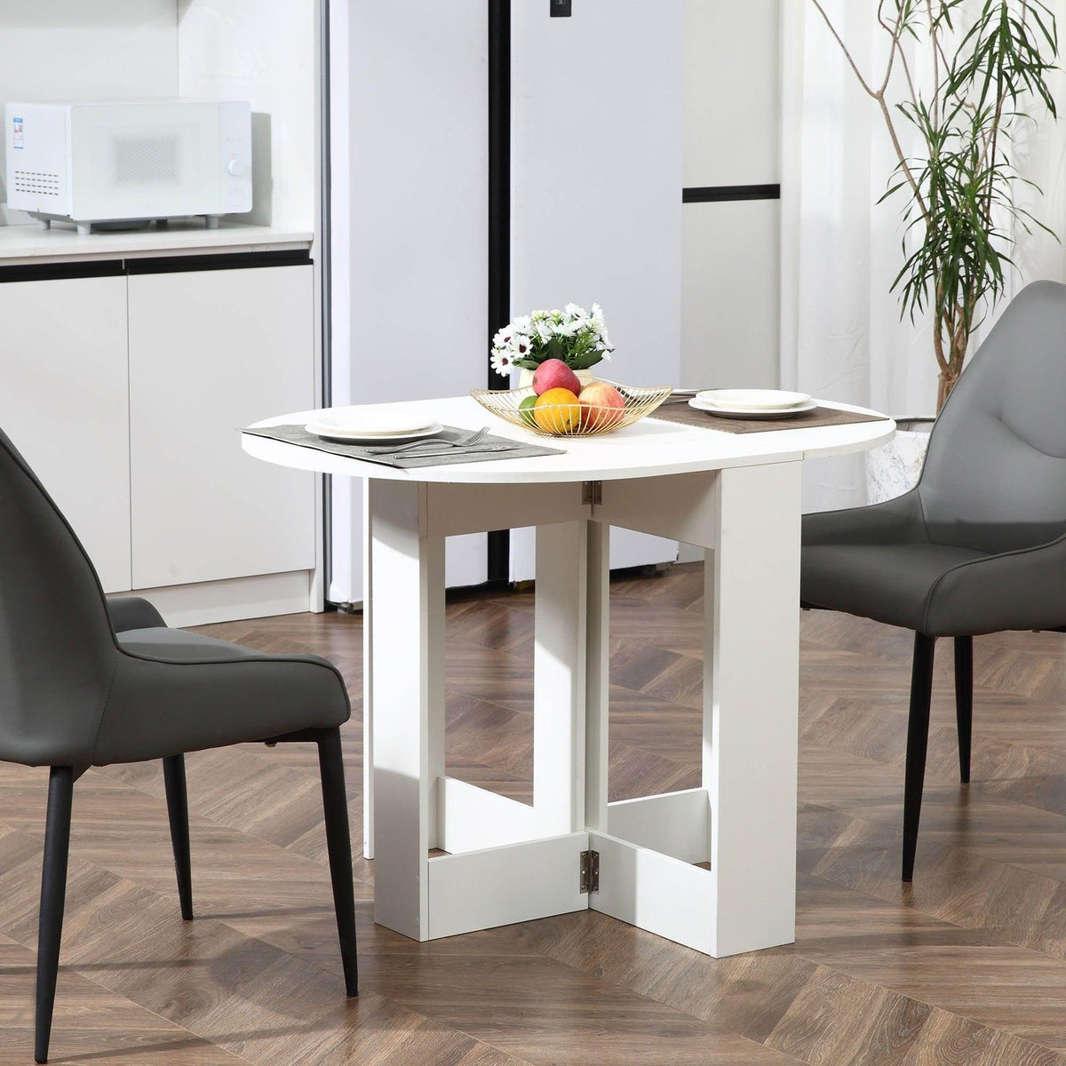 White folding bar table with rounded tabletop and lower shelf; compact for small kitchens.
