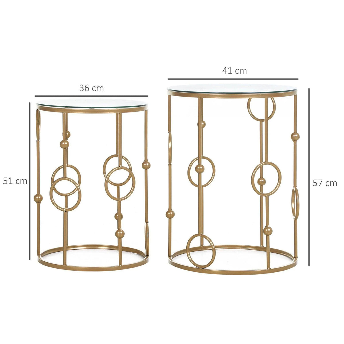 Pair of gold round nesting tables with clear glass tops and decorative ring details