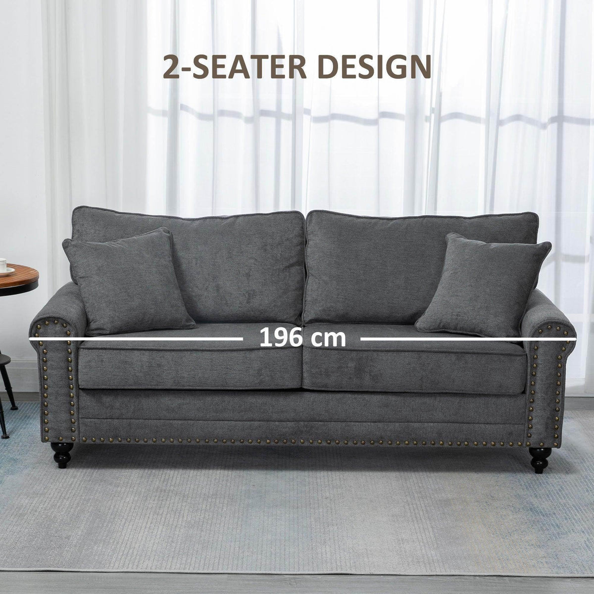 Gray two-seat loveseat with three back pillows and nailhead-trim base