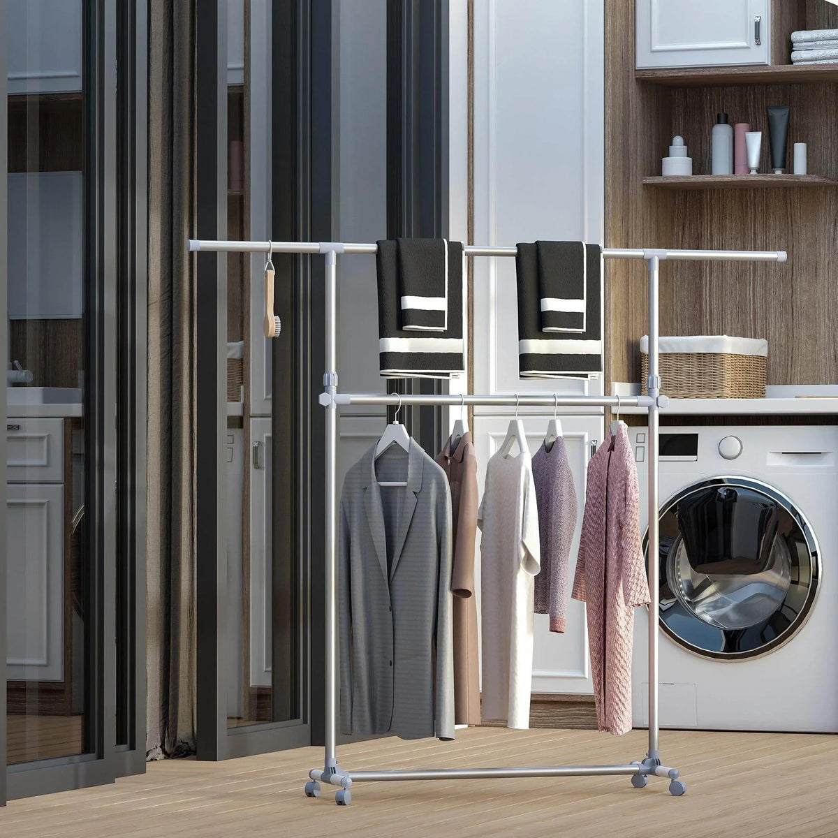 Rolling clothes hanger rack with metal frame, wheels, and hanging shirts and towels