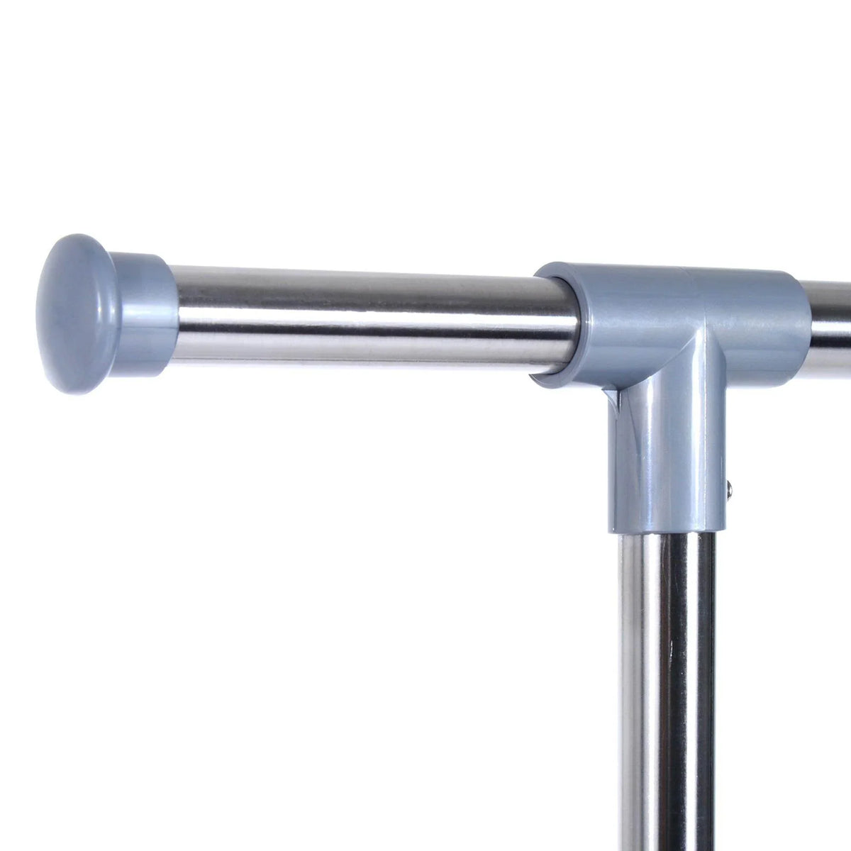 Metal clothes rack corner joint with gray caps and silver support tubes