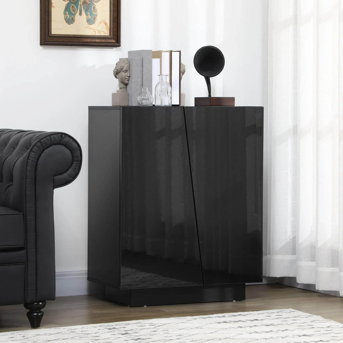 High-gloss black storage cabinet with two doors and spacious base storage