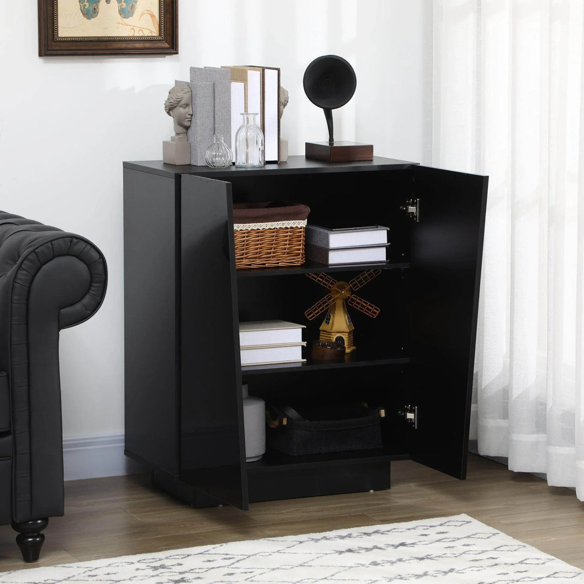 High-gloss black storage cabinet with two doors, open center shelves, and storage bins