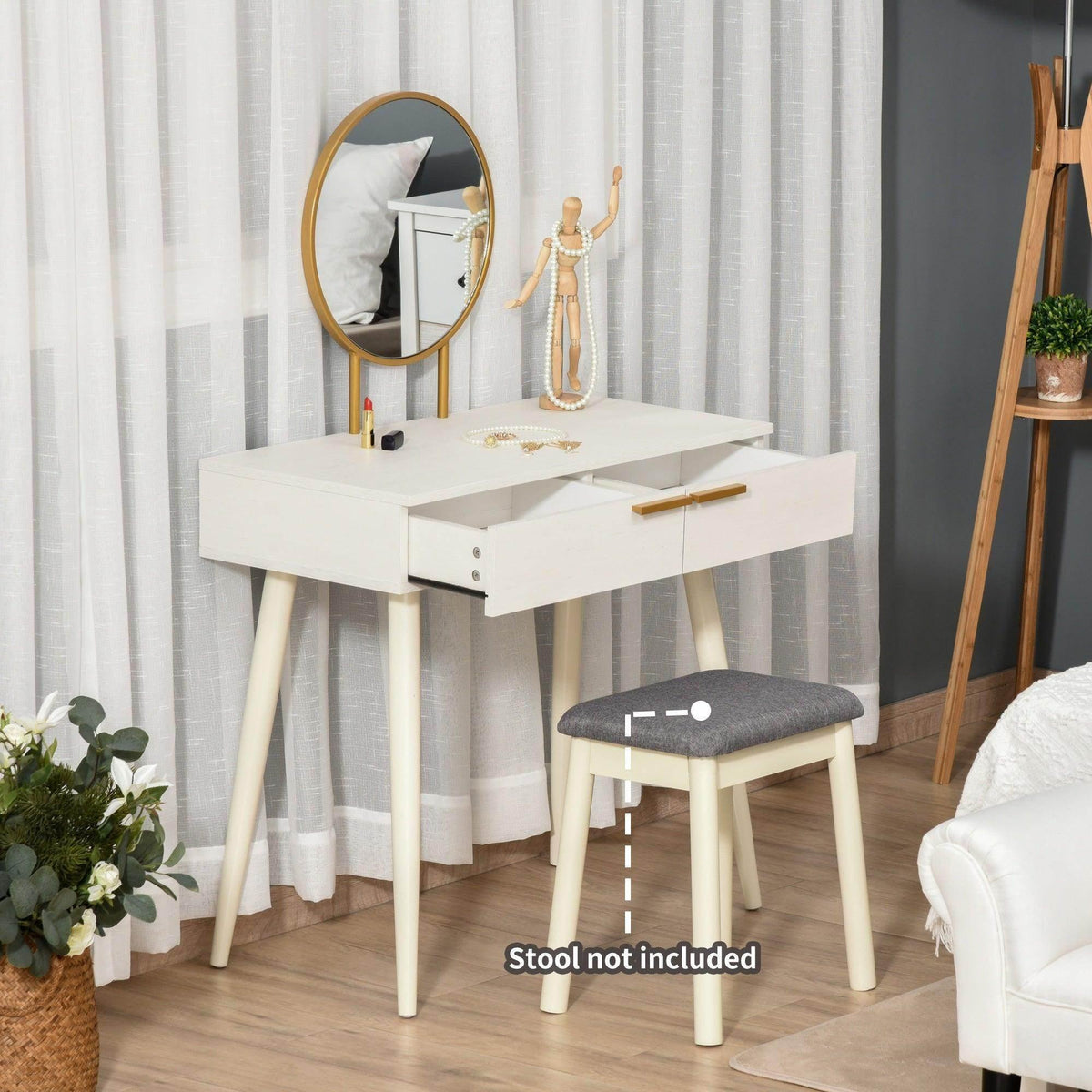 White vanity table with round mirror and gold drawer handle, vanity top shown