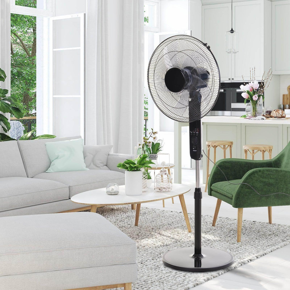 Oscillating floor fan with black front grille, three-blade hub, and round base