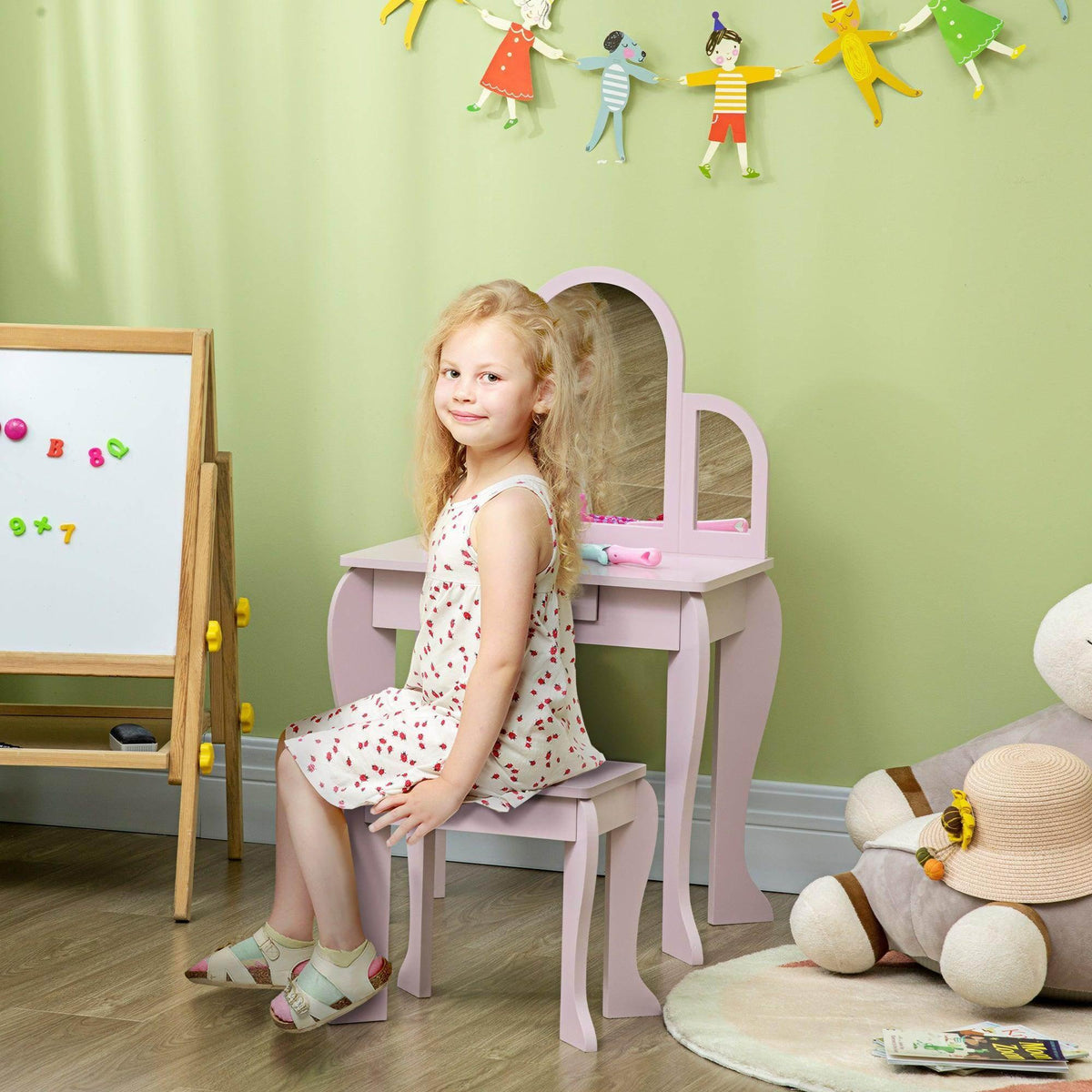 Pink kids vanity table set with heart-shaped mirror and matching stool