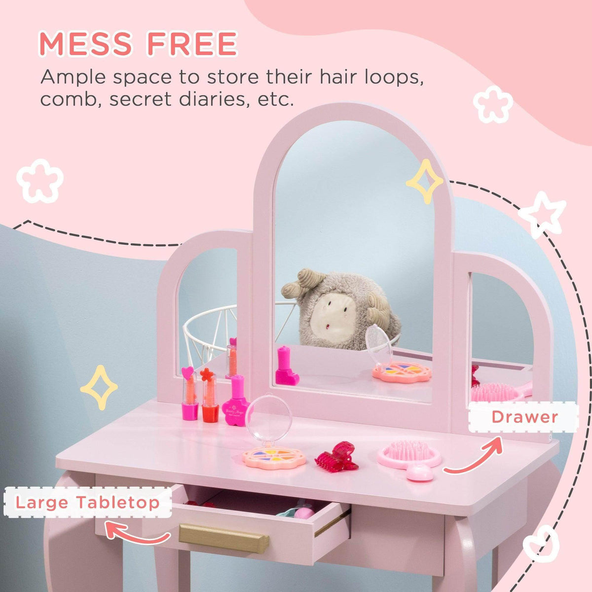 Pink kids vanity table with arch mirror, open drawer, and accessories
