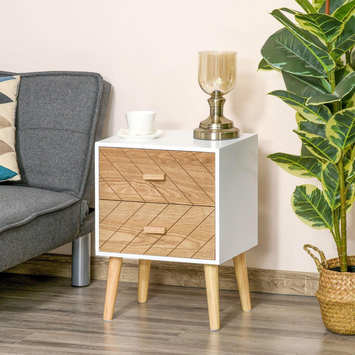 Scandinavian bedside table with two drawers, white frame, light wood geometric fronts.