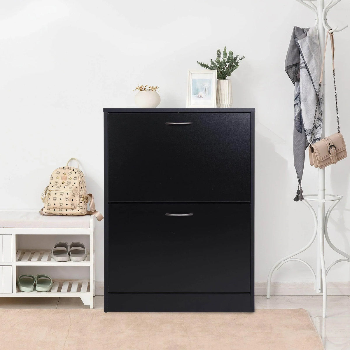 Black 2-tier shoe cabinet with two drawers and curved metal pull handles