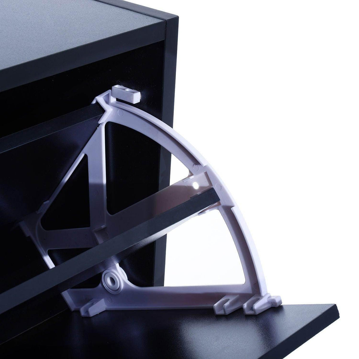 Adjustable shoe rack inside black cabinet with metal supports