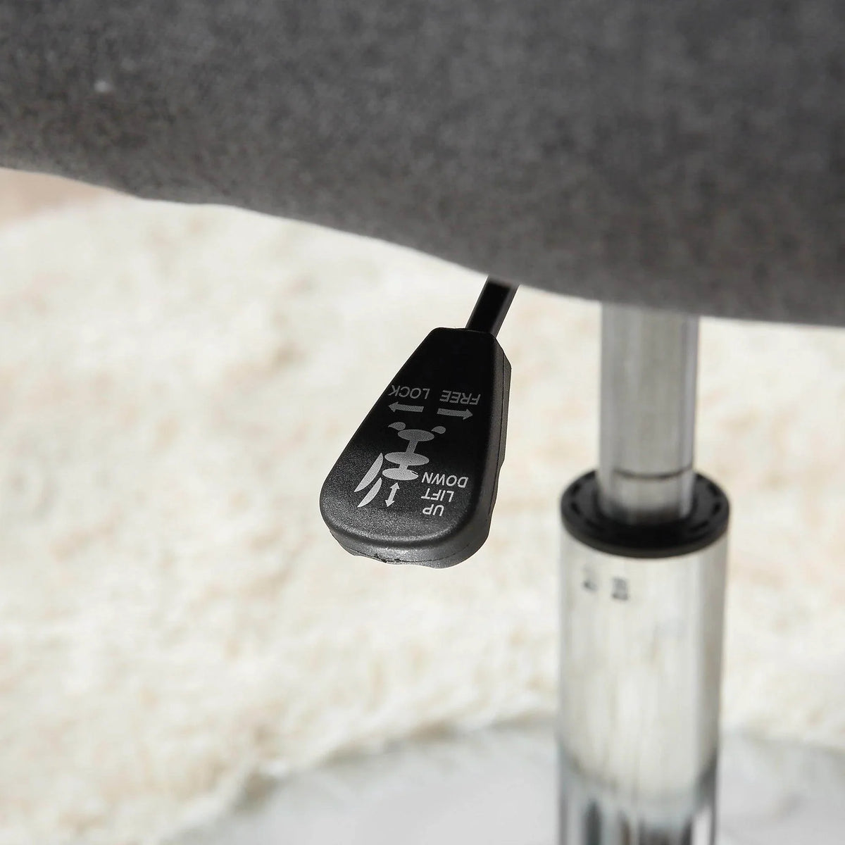 Height-adjustment gas lift knob beneath chrome pedestal base
