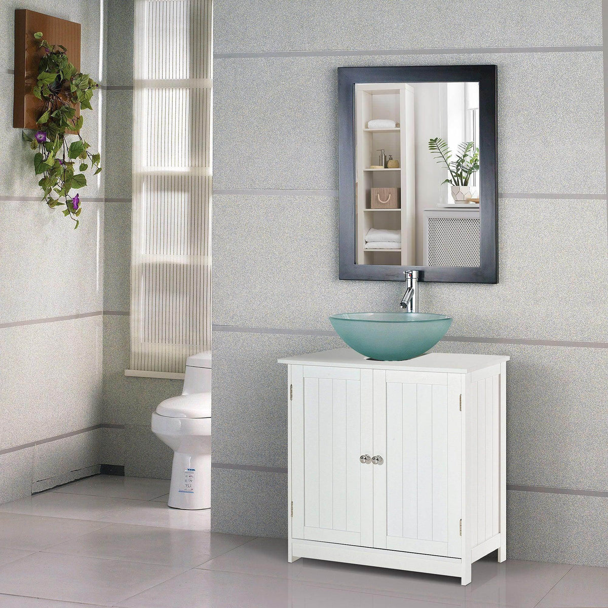 White under-sink storage cabinet with two panel doors and silver knob pulls