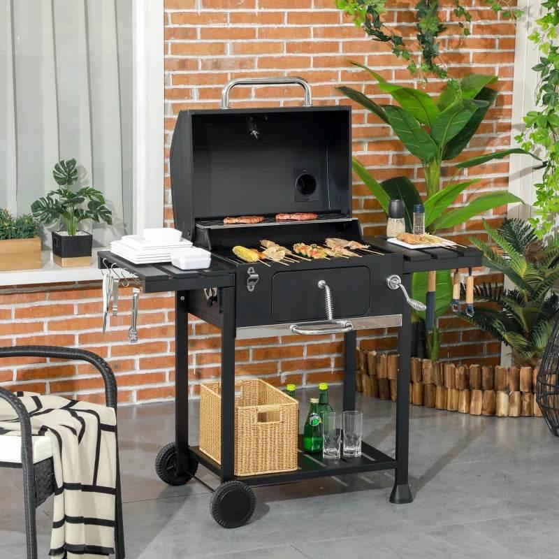 Charcoal BBQ grill in dark charcoal with open lid, side shelves, and warming rack