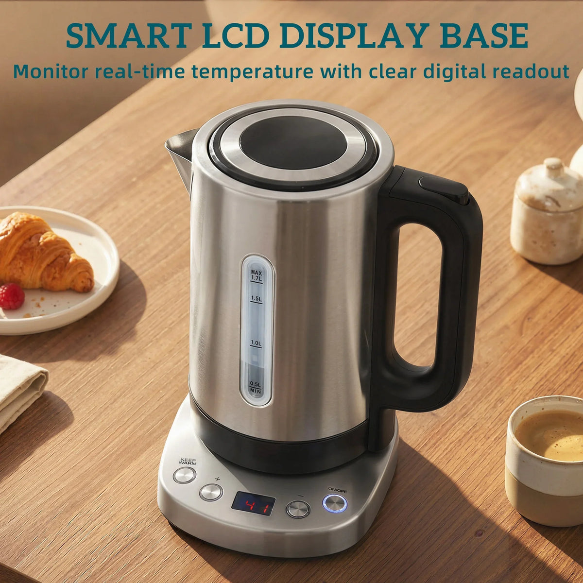 Silver electric kettle on smart LCD display base, angled view with black spout cover
