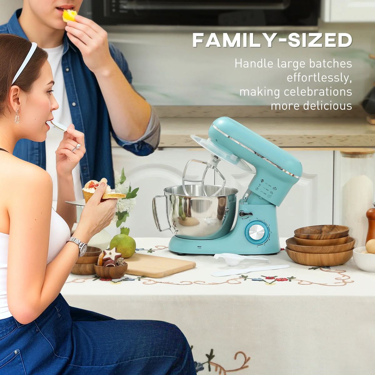 Blue stand mixer with stainless steel bowl on countertop