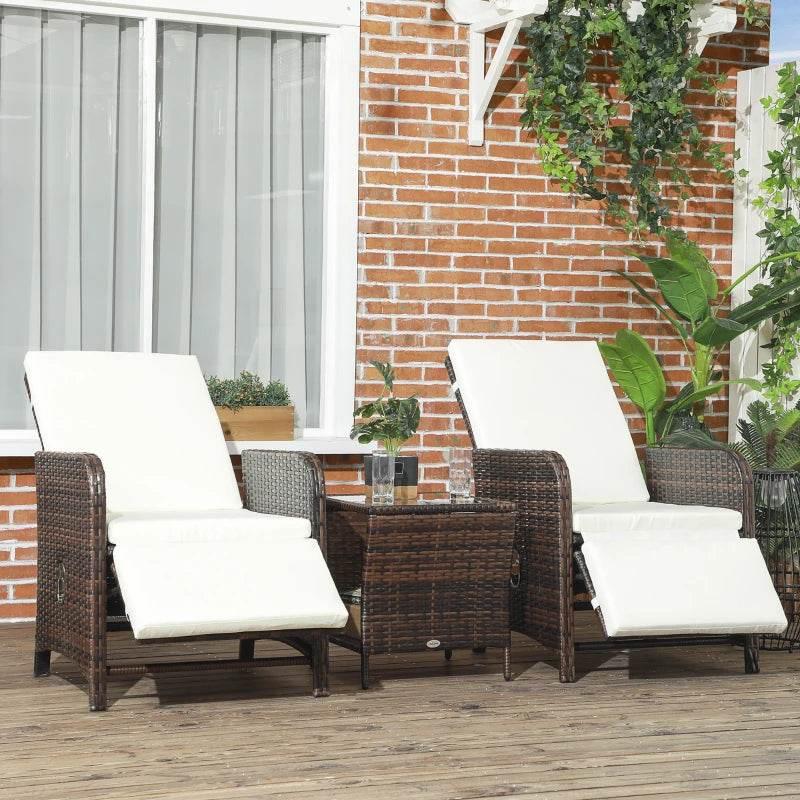 Mixed-brown rattan bistro set with three chairs and white seat cushions plus glass table