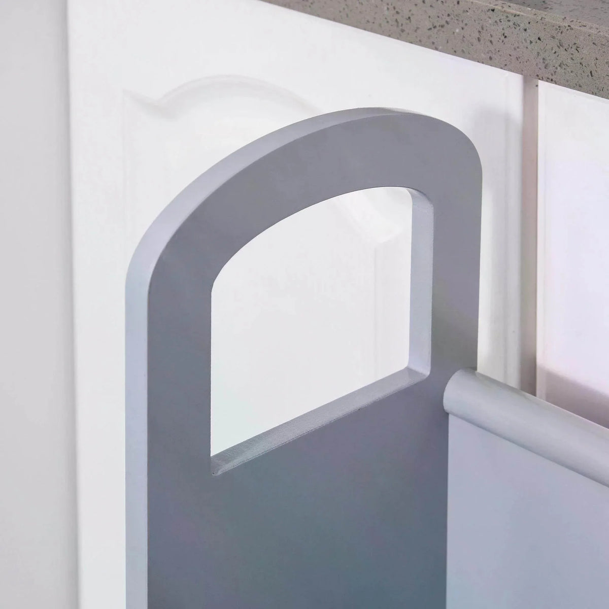 Safety handle on grey wooden step stool with arched grip frame