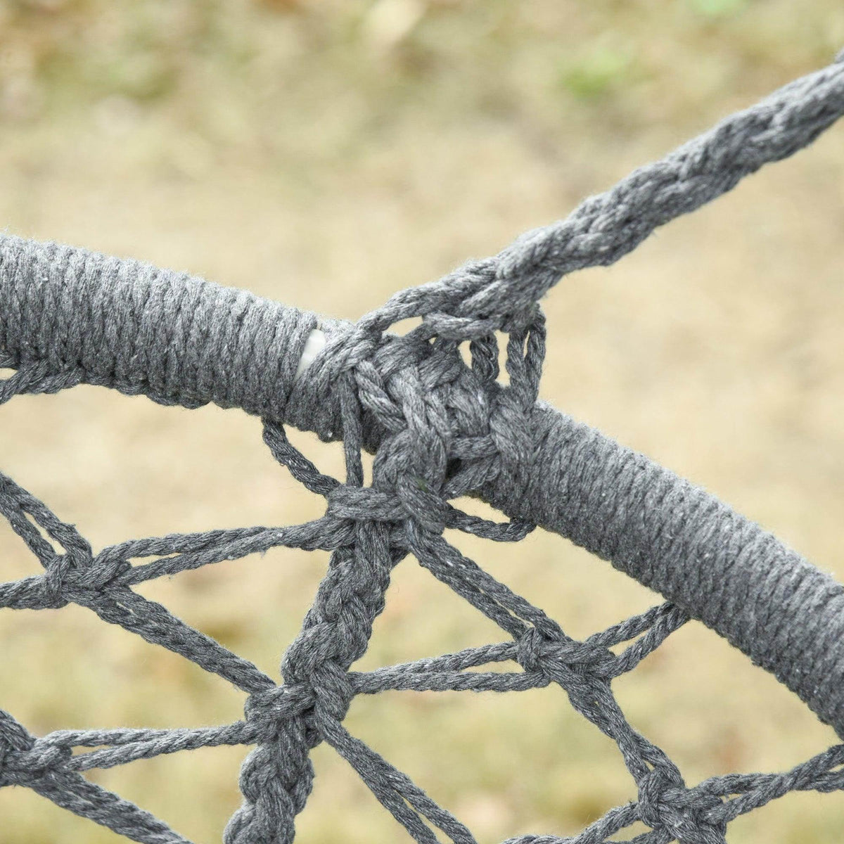Dark grey cotton rope hammock net knot detail with braided rope texture