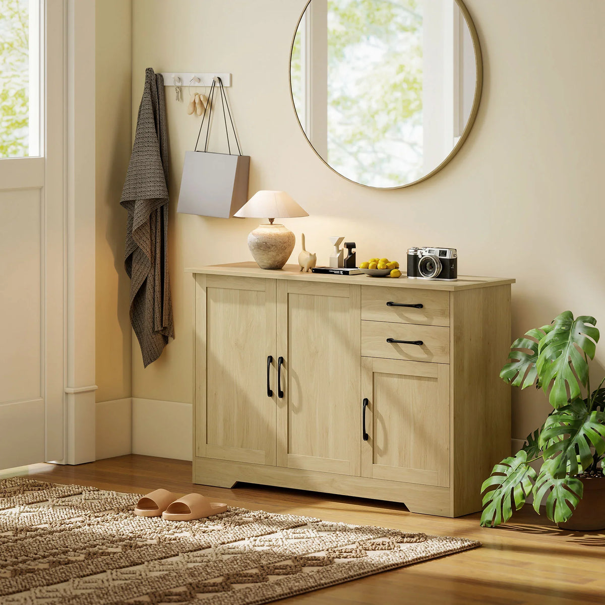 Natural wood sideboard with 2 drawers and 3 doors, black bar handles, front-left view.